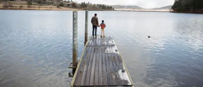 Dad and son on dock