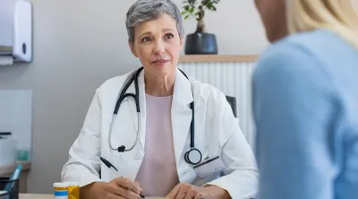 Doctor speaking to a patient