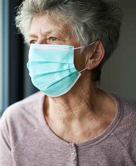 Elderly woman wearing a face mask