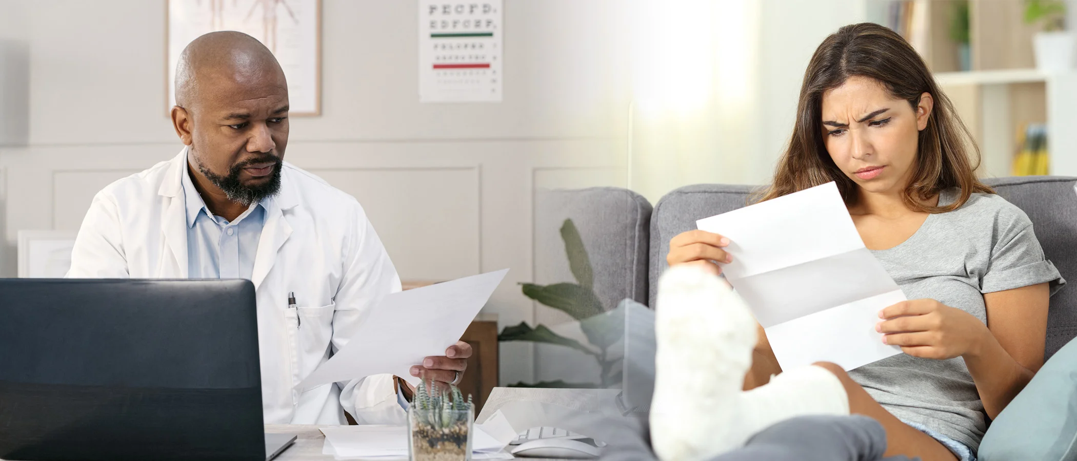 A doctor reviews documents at his desk while a woman with a bandaged leg sits on a couch, looking concerned as she reads a document