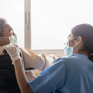 Dad holding daughter