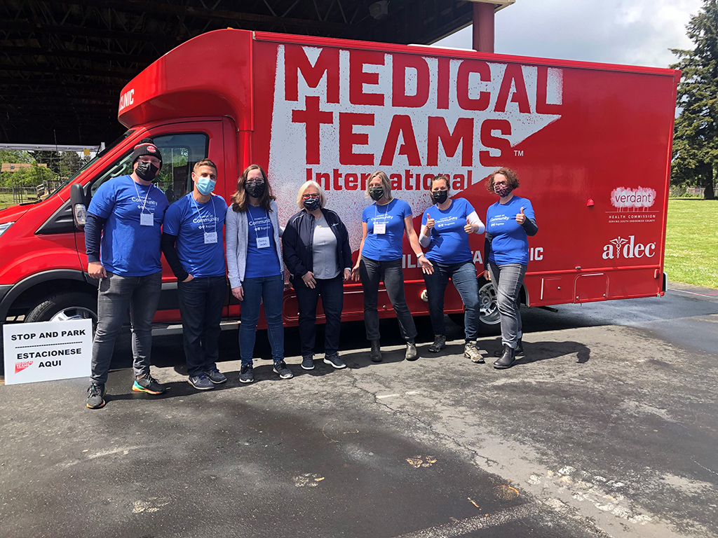 Medical team in front of truck