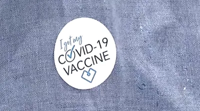 Round sticker that says I got my COVID-19 vaccine