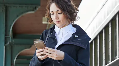 Millennial woman on a smartphone