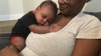 woman holding baby