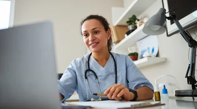 medical professional on computer