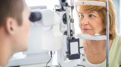 Woman receiving an eye examination at the optometrist's office