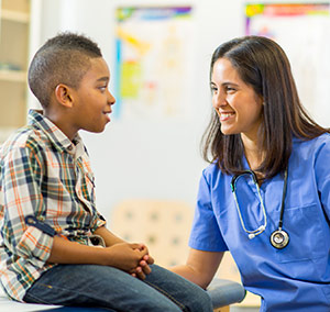 Nurse talking to a child